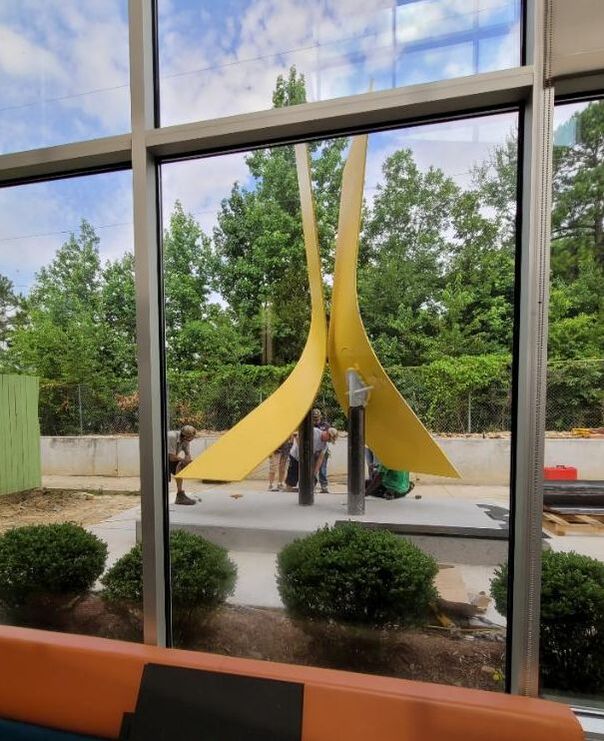 Kathleen Caricof and the National Sculptors' Guild are in Little Rock installing 
