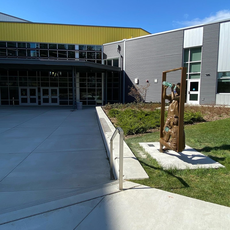 We’ve just installed Macro/Micro Discoveries by Clay Enoch and the National Sculptors' Guild at Surprise Lake Middle School in Milton, WA.
The school is phenomenal and we’re so proud to be a small part of it through this artwork. Special thanks to everyone; Tom, Don, Clint and Mark from @slms.sabers, Mike and Deanne from @artswa, installation expertise from NSG sculptor @markleichliter, @shipperssupplycustompack, @artcastingsco foundry, and last but not least - all the SLMS students that will enjoy this sculpture on their campus. #SculptureIsATeamSport
“Macro/Micro Discoveries” is a statement about the explorative nature of learning, where new worlds open up, big and small, with a simple shift in perspective. The student body is represented by two bronze figures. Glass elements symbolize the abstract subject. The figures are united by a stainless-steel architectural frame, the window to the worlds of discovery.
See more of the process on our site:  http://www.jk-designs-inc.com/.../macromicro-discoveries...
#ClayEnoch #NationalSculptorsGuild #NSG #PublicArt #SLMS #SLMSsabers #SurpriseLakeMiddleSchool #Fife #Milton #Washington #MicroMacro #Discoveries #Bronze #StainlessSteel #Monument #Education #Explore #Wonder  #ArtistDriven #ClientMinded #Celebrating30Years @claysculptor