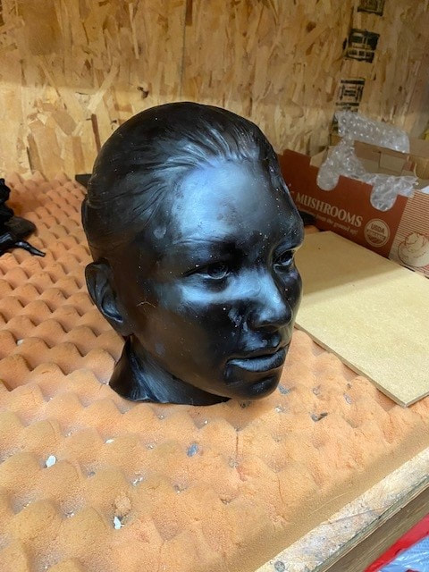 Update 2/1/2023: The Female Officer sculpture has been poured into wax, ready to transform into bronze. She's already looking great! Update: 1/5/2023  Things are progressing on the Tribute to Public Safety project for the City of Cerritos. Gary Alsum's  fire fighter casting is nearing completion at Bronze Services Foundry.  Not to worry, he'll get that helmet on. Certain elements on the sculpture have been customized to match LA County badges and gear.  Next comes patina on this one. Update 12/11/2022: We've completed the landscape plans with help from Diaz Landscape Architecture and site work will commence soon.  ​As we designed, the overall 51-ft x 54-ft site will include: Three Bronze Monuments; 9/11 Memorial; Department Memorial. 7-ft x 16-ft Tribute Wall with engraving of Plaza Title, City Insignia, Department Badges and quotation; 4-ft x 12-ft East Wall with two engraved quotations; Concrete Plaza; Lights; Flag Pole, White Roses. Decompressed Granite area with Bosque of Trees. Update 12/1/2022: The K-9 Unit is nearly finished in clay! It's exciting to see all the elements coming to life for this special project. Update 11/7/2022: Gary Alsum has finished sculpting the Female Deputy Sheriff in clay. She's off to the foundry to begin the bronze casting process. Update 5/26/2022: The Hardscape Design Elements have been refined and the stone is ordered. Lettering will be etched into several tons of granite for this placement. 2/18/2022: You may not realize, but monumental placements start small. On this one, we went REAL SMALL. John created a model of the site with our proposed layouts for the city to choose from.  We've just been approved on our design for the City of Cerritos' First Responders Plaza which will be located in front of the Sheriff's Department. Our design team is transforming the 2500 sq ft lawn into an artful gathering space that honors first responders.  Three monumental bronze sculptures by NSG's Gary Alsum will be the focal point of our Tribute to Public Safety. Granite walls will be adorned by quotes and insignia. A memorial will be placed to pay tribute to the city's fallen officers. And a Bosque of Trees forms a nurturing space to house the new 9/11 memorial. The entire site becomes a piece of art. We are really pleased with the design and how this will enhance the community.  We are looking forward to sharing the process here, stay tuned.