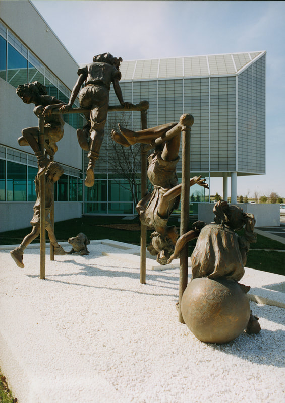 National Sculptors' Guild public art placement 35 Jane DeDecker's Bronze Jungle Gym Oxnard, California 1995 ​The National Sculptors' Guild placed Fellow Jane DeDecker's "Jungle Gym" in Oxnard, California in 1995.  ​The 125% life-size multi-figurative bronze features five-children at play on a jungle gym, with a dog eager to join in the fun at the laces of one of the kids. The piece is a reminder of simpler days of play in parks and schools.   The sculpture measures 11ft tall, 15ft wide, 5ft deep. Purchased by the City of Oxnard, California.  NSG public art placement 35