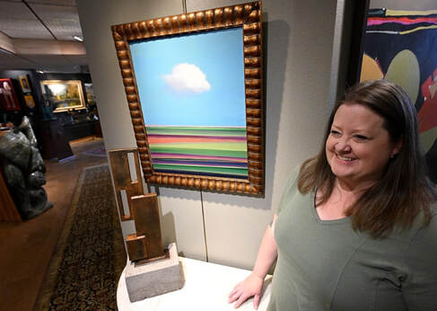LOCAL NEWS Five Questions: Alyson Kinkade, a lifetime in the arts  Columbine Gallery closing June 1 By PAMELA JOHNSON  Loveland Reporter-Herald May 7, 2023 at 8:00 p.m.  Alyson Kinkade has been creating art for, as she said, “as long as I can remember.” ​ The painter, who runs Columbine Gallery in Loveland with her dad, John Kinkade, is one of 62 artists with pieces in the Governor’s Art Show underway at the Loveland Museum, and dips her paintbrush into many different colors of the art world.  With the National Sculptor’s Guild, she helps place large sculptures in public art collections.  With the gallery, which is closing in June and transitioning to online only, she has provided a place for artists to display and sell their work, and for people to view a variety of different types of art. With her paints, she creates a unique world for people to enjoy.  1. How did you first start as an artist? What is your specialty? I have enjoyed creating art for as long as I can remember, with great art teachers throughout my primary schools in Greeley and Loveland, and a supportive family with creative friends even before my family started the art gallery. I grew up with encouragement to try all methods and materials that art can take form in, going to the Creative Arts Center all through elementary school.  ...  My (junior high) art teacher was Dan Augenstein -- we called him Auggie -- who I later got to represent as an artist in our gallery. He’s also in the Governor’s Art Show. He specialized in ceramics at the time, so I created a series of ceramic animals that I then sold at Arts Picnic. Connie Einfalt and Laurie White were my art teachers at Loveland High and they were wonderful for exploring photography, sculpture and jewelry making, rare mediums to find at public schools. An enthusiastic art teacher makes a huge impact for a young creative and I’ve remained in contact with them. My junior year of high school I was fortunate enough to spend a summer at Interlochen Arts Camp, which helped me develop a portfolio to get a scholarship to attend the Kansas City Art Institute where I honed in on painting as my primary medium. Following graduation, I lived in Santa Fe where we had a second gallery at the time that I managed for a few years while also creating artwork; then returned to Loveland where I currently live, work and create.  My specialty is oil painting. I have a couple series right now, abstract landscapes and representational custom pet portraits. It’s nice to have the freeing intuitive work of the landscapes balanced by the tighter animal paintings. I love doing both.  2. What is your inspiration, in life and in art? I am inspired by nature. I love to visually take in the expansive plains of Colorado with ever changing skies. I’m equally inspired by animals and helping groups who advocate for them. Proceeds from my ‘Happiness Is’ pet portrait series help me contribute to animal welfare organizations. I love to give back through my art. The use of stacked colors in my landscape paintings represent one’s goals and ambitions laid out before them; and the sky is the space to contemplate new ideas. The horizon is where dreams and aspirations meet.  3. Describe the Governor’s Art Show. What makes it special? What is the draw for residents? I am very proud to be juried in for my 10th time. It is wonderful to be part of such a unique show that gives back to the community through its sales. The 32nd Colorado Governor’s Art Show and Sale is one of the largest juried fine art shows in the state. It runs through June 11th at the Loveland Museum. ...  What makes it so special is that it is truly is an “Art with Heart” exhibit, the show benefits Loveland and Thompson Valley Rotary Clubs’ charitable projects and causes. One-third of the proceeds go to the Thompson Education Foundation’s Homeless Assistance Fund and additional funds go toward scholarships for local art students. Scholarship winners have a piece displayed in the show on the back wall. I have met them, and they are impressive young people with bright futures.  Since 2016, the Governor’s Art Show has had different jurors every year, and that makes each show so distinctive and shows off new artists purely by the aesthetic value of who juried. This makes the show fresh, diverse, and full of what Colorado artists are currently expressing. There are 62 artists on display. You will discover artists from all corners of the state, and there is something for everyone. ... The caliber of artists in the show is unmatched. (https://governorsartshow.org)  ​4. What is the history of Columbine Gallery? I understand that the physical gallery will be closing. Why and what are the plans for transitioning online? What will become of the building? Yes, this is our final month of being open to the public as Columbine Gallery. ... My father (John Kinkade) founded the National Sculptors’ Guild in 1992 with a dozen sculptors who wished to find thoughtful public applications for their work. JK Designs is the design team that promotes and provides consultation for the Guild. Columbine Gallery was opened as a space to show the artwork by members of the National Sculptors’ Guild when cities and companies would come out to meet on large-scale commissions. We started out in a small space at 1032 Lincoln Ave. The gallery walls were used to showcase regional painters, and after moving to our current location 2683 N. Taft Ave., Columbine grew into one of Northern Colorado’s largest fine art galleries housing over 50 artists at one time, and the adjacent National Sculptors’ Guild Sculpture Garden filled with 85-100 sculptures year-round.  After 30 years, we have elected to refocus our time and energy on the National Sculptors’ Guild and placing large-scale artwork in commercial and public spaces. Many Lovelanders may be unaware that we have a full-scale public art business, placing over 550 significant monuments across the nation over the years. While we have thoroughly enjoyed working with art appreciators of all levels, the true passion has always been in the design team approach it takes to place great public art. That is how we started, and we are feeling it is time to devote ourselves to the Guild once again.  We will continue to sell much of the artwork online, (nationalsculptorsguild.com), which has become a popular choice among art collectors.  ...  This transition to less show space also allows me to pursue more opportunities for my own artwork, and my father can continue to work on his philanthropic projects that often combine the arts and helping community. It has been a privilege to serve the community of Loveland and our amazing stable of artists over the years. We look forward to continuing to do so in a different capacity.  We are thrilled to see someone new take the space with new energy and ideas to make their own mark on this special art-filled city. The Taft Avenue gallery and garden will continue to showcase art as the new owner is currently working to open ‘par-a-dox fine arts’ this summer. There will be different artists and events that will renew the space with creative energy. It feels good that our legacy will continue in this way.  5. What are your favorite places to enjoy art in Loveland? Columbine Gallery and Garden (through May), Benson Sculpture Garden, Loveland Museum, Artworks, Artspace, Downtown Loveland (rotating sculptures and the growing mural collection) some of the local restaurants have fun rotating artwork (Muse, Verboten, Henry’s, West End) and occasionally I grab a blizzard at the Dairy Queen and enjoy seeing sculptures on loan there too. Loveland is full of great art and artists everywhere you go.  Bonus: What advice would you give to aspiring artists? Dream big, put in the hours, seek out those who support your efforts, and give back when you can.  Alyson KinkadeYears in Loveland: 26 Occupation: Artist, director at Columbine Gallery  Pamela Johnson | Assistant Editor Pamela Johnson is an award-winning journalist with two decades invested in the community of Loveland. She covers education, county government, environmental issues, outdoor recreation and whatever else she finds along the way. johnsonp@reporter-herald.com  Follow Pamela Johnson @RHPamelaJ